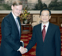 U.S. Deputy Secretary of State Robert Zoellick (L) shakes hands with China Premier Wen Jiabao, at the Diaoyutai State Guest House in Beijing, January 24, 2006. Zoellick is in Beijing to hold talks with senior chinese officials expected to cover nuclear standoffs with Iran and North Korea