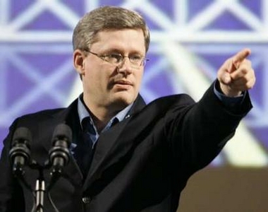 Conservative Party of Canada leader Stephen Harper surveys the election night setup at the Calgary Convention Centre several hours before polls close in Calgary January 23, 2006.