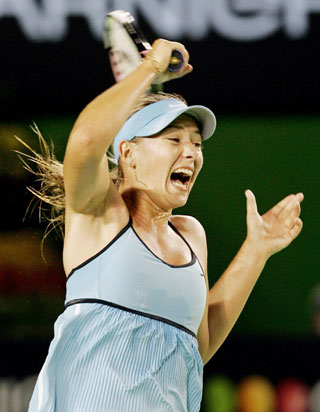 Maria Sharapova of Russia hits a forehand during her match against Justine Henin-Hardenne of Belgium at the Australian Open tennis tournament in Melbourne January 26, 2006.