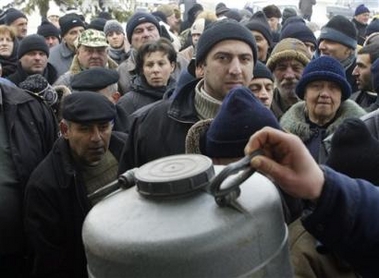 Georgians line up to get kerosene in Tbilisi, Georgia, Friday, Jan. 27, 2006.