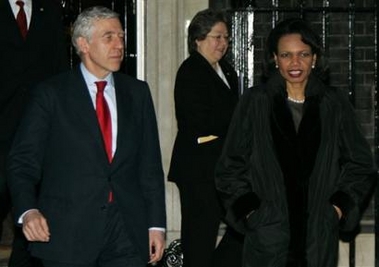 Britain's Foreign Secretary Jack Straw, left, looks on as US Secretary of State Condoleezza Rice leaves 10 Downing Street in London, Monday Jan. 30, 2006.