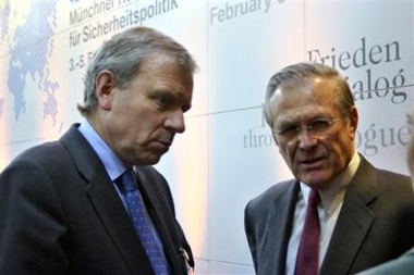 In this photo provided by the International Conference on Security Policy, Jaap de Hoop Scheffers, NATO Secretary General, left, and U.S. Secretary of Defence Donald Rumsfeld, right, meet prior to the International Conference on Security Policy in Munich, southern Germany, Saturday, Feb. 4, 2006.