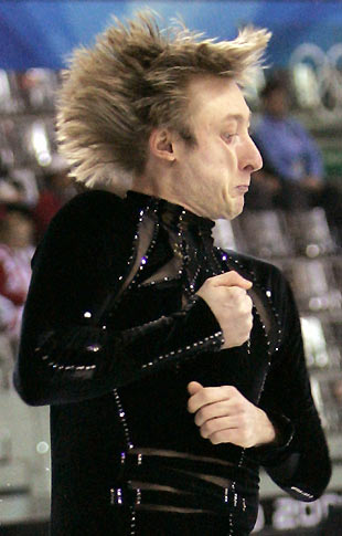 Evgeni Plushenko from Russia performs during the figure skating men's Short Program at the Torino 2006 Winter Olympic Games in Turin, Italy, February 14, 2006. [Reuters]