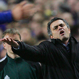 Chelsea抯 manager Jose Mourinho reacts during play against Barcelona during their Champions League first knockout round first leg soccer match at Stamford Bridge in London February 22, 2006.