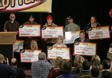 Eight workers at a Nebraska meatpacking plant are really bringing home the bacon now: They stepped forward Wednesday to claim the biggest lottery jackpot in U.S. history ?US$365 million. 