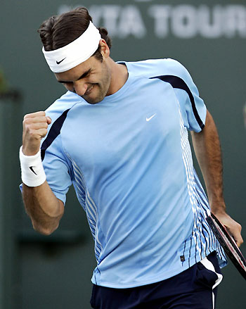 Roger Federer of Switzerland celebrates his victory over Richard Gasquet of France at the Pacific Life Open tennis tournament in Indian Wells, California March 15, 2006. [Reuters]