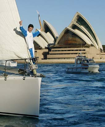 Olympic torch begins world odyssey in Sydney 