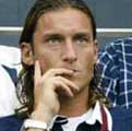 Totti won't appeal three-game spitting ban