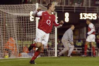 Henry double leads Arsenal rout of Palace