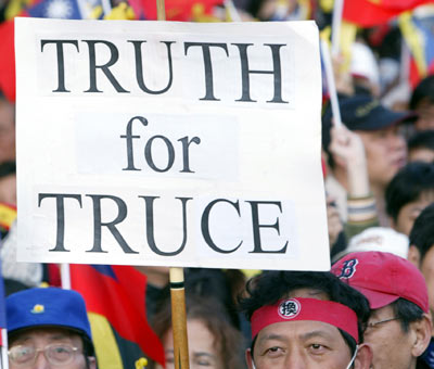 Tens of thousands in Taipei protest shooting