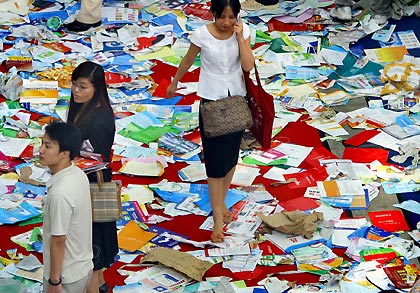 Leaflets cover floor at a Nanjing medical expo