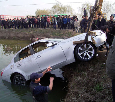 BMW in the pond