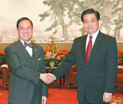 President Hu meets with HK chief