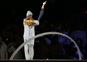 Olympic flame lit over Turin as Winter Games begin