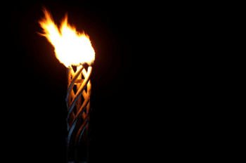 Olympic flame lit over Turin as Winter Games begin