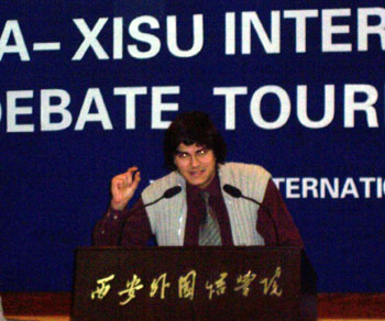 A debater is answering rival's question