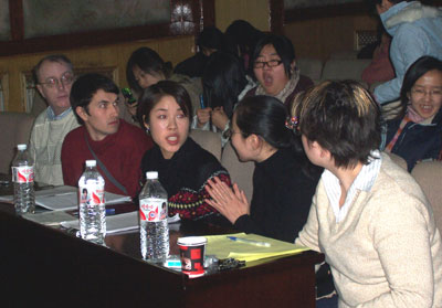 The judges are talking about the performances of the debaters