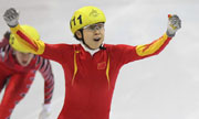 China's Wang wins gold in short track