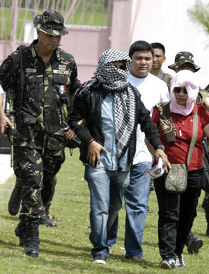 Top suspect in Philippine massacre turns himself in