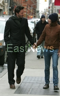 Keanu Reeves strolls with girlfriend