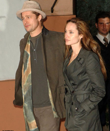 Angelina Jolie and Brad Pitt leaving a restaurant