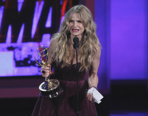 Kyra Sedgwick accepts the award for outstanding lead actress in a drama for 'The Closer'