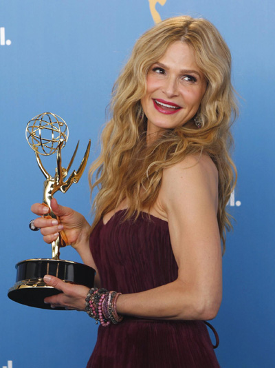 Kyra Sedgwick accepts the award for outstanding lead actress in a drama for 'The Closer'