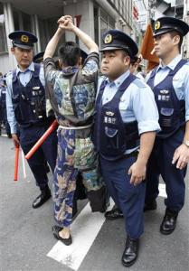 Protests, police at Japan opening of 