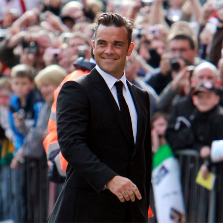 Robbie Williams working out baby deal