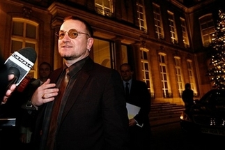 U2's Bono presses for French aid
