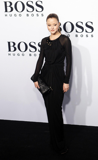 Celebs arrive at a show of German fashion label Boss