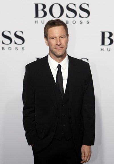 Celebs arrive at a show of German fashion label Boss