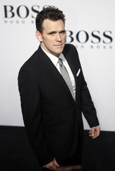 Celebs arrive at a show of German fashion label Boss