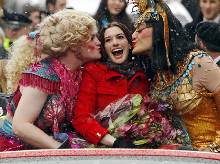 Anne Hathaway is all smiles during the Hasty Pudding Woman of the Year Parade