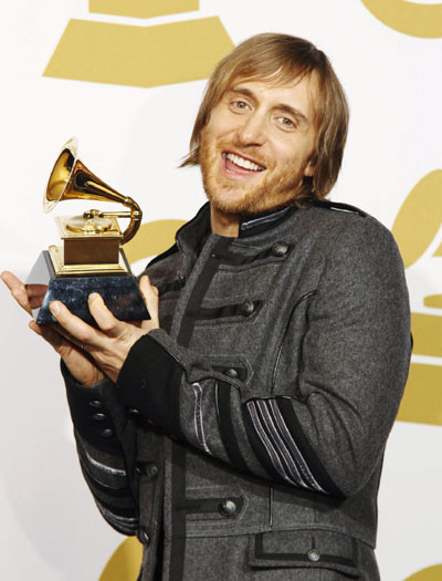 David Guetta holds his Grammy award for best