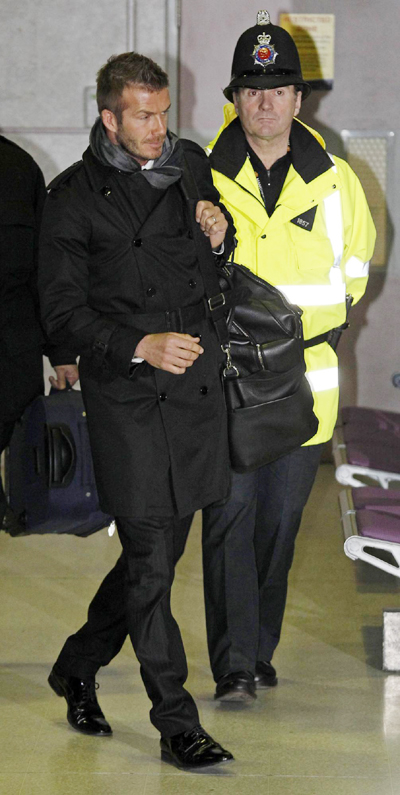 David Beckham arrives at Manchester Airport