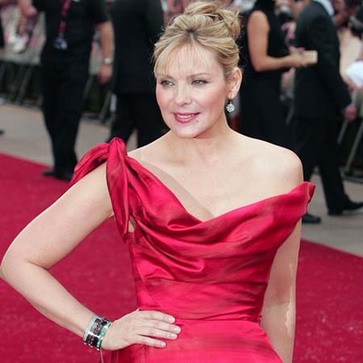 Kim Cattrall happy with cat