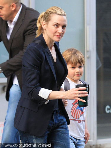 Kate Winslet and Sam Mendes step out again without rings for kids