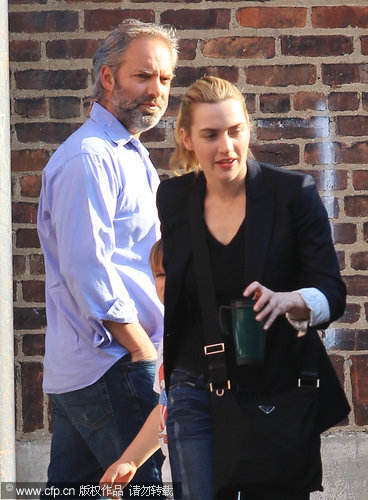 Kate Winslet and Sam Mendes step out again without rings for kids