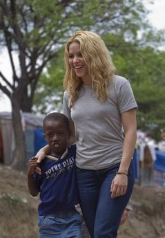 Shakira visits Haitians living in tent camps
