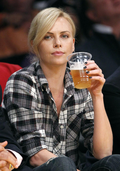 David Beckham and Charlize Theron at NBA Western Conference playoff series