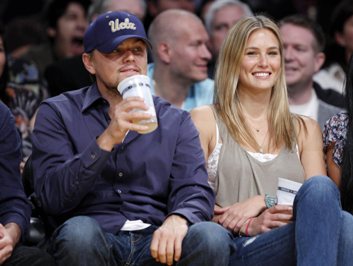Leonardo DiCaprio and his girlfriend at NBA
