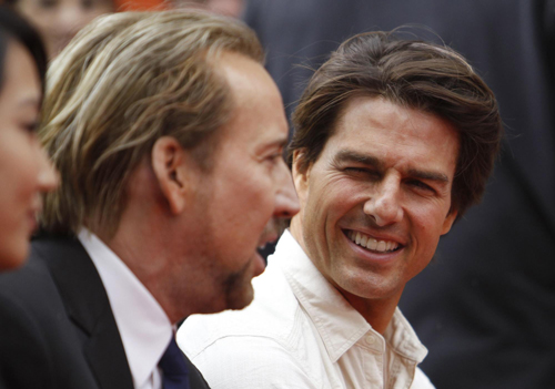 Actors Nicolas Cage and Tom Cruise attend hand and footprints ceremony for producer Jerry Bruckheimer