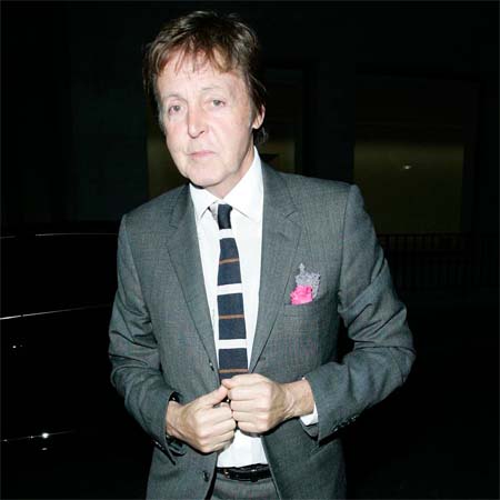 Paul McCartney works round daughter