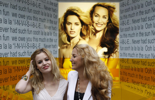 Georgia May Jagger  and mother promoting a sun cream