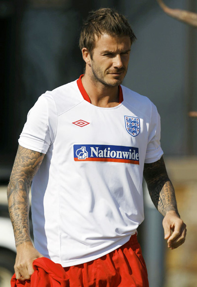 England's Beckham arrives for a training session near Rustenburg