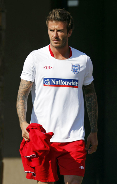 England's Beckham arrives for a training session near Rustenburg