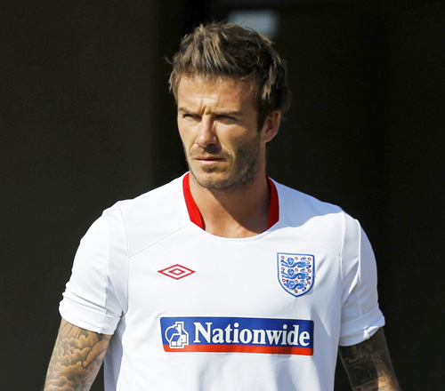 England's Beckham arrives for a training session near Rustenburg