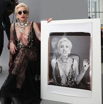 Lady Gaga shakes it for a Polaroid picture