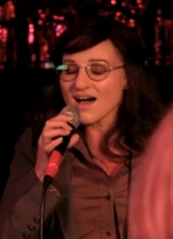 ewel goes undercover at karaoke bar for Web v